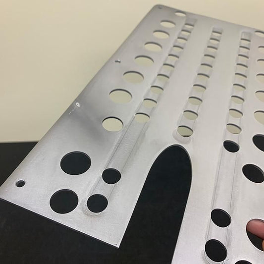 Close-up of the JYKK AR ver3 removable replacement deck in Raw