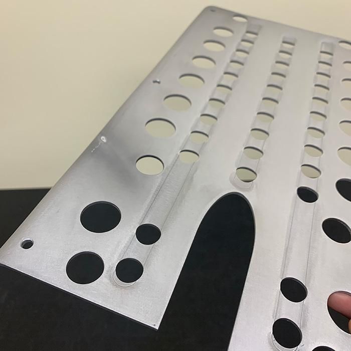 Close-up of the JYKK AR ver3 removable replacement deck in Raw