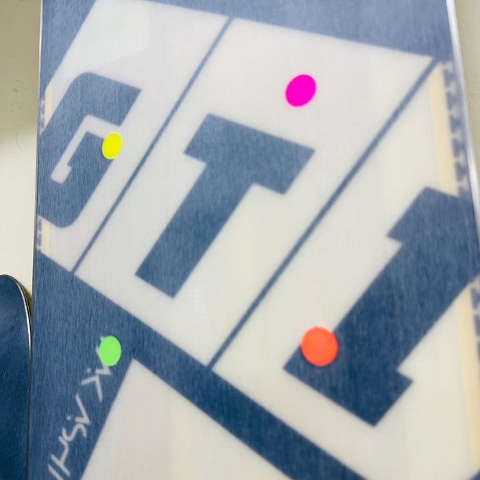 Rear running surface detail with four colored dots