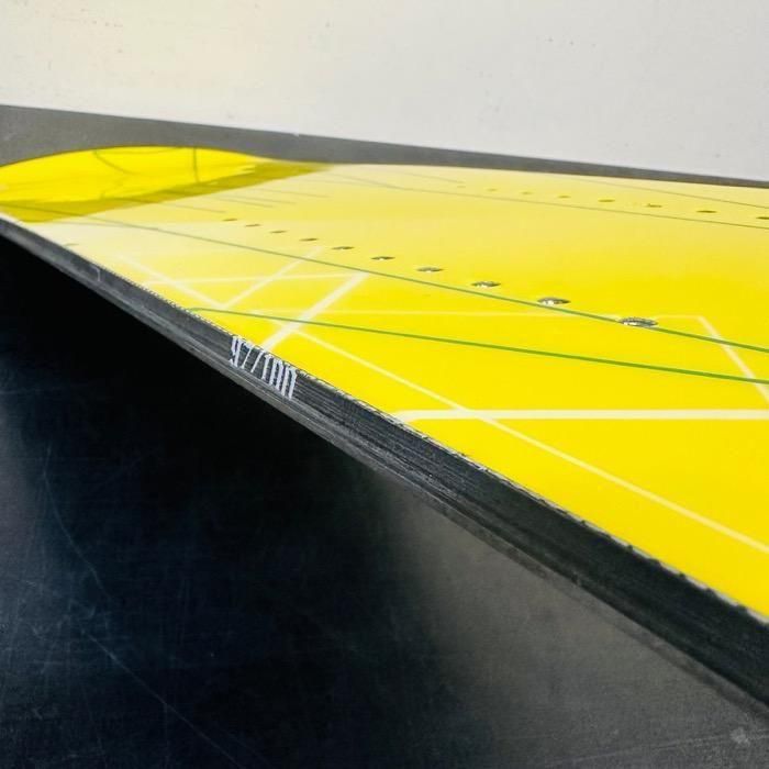Actual board, sidewall and topsheet edge with visible scuffs
