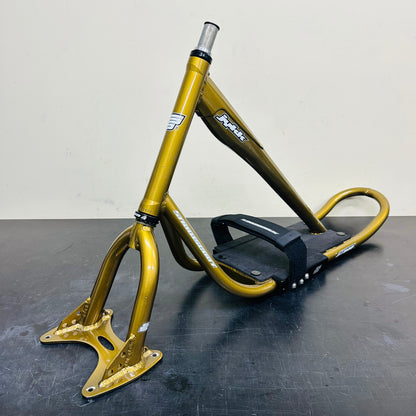 Serviced used JYKK S64 gold frame and fork set, front three-quarter view
