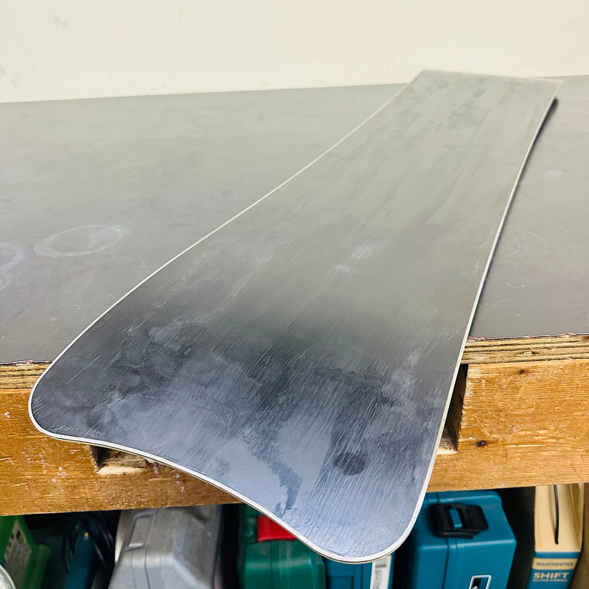 Used TORINITY IT Deep Space Blue hard-flex rear board, angled view of structure-tuned base