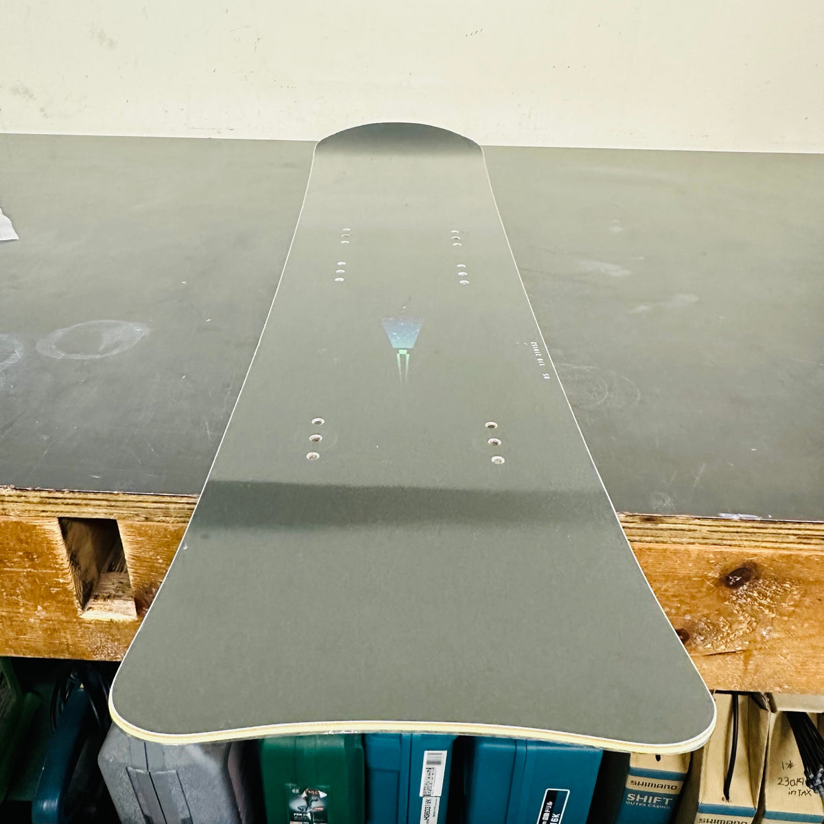 Used TORINITY IT Forest Green hard-flex rear board, angled topsheet view