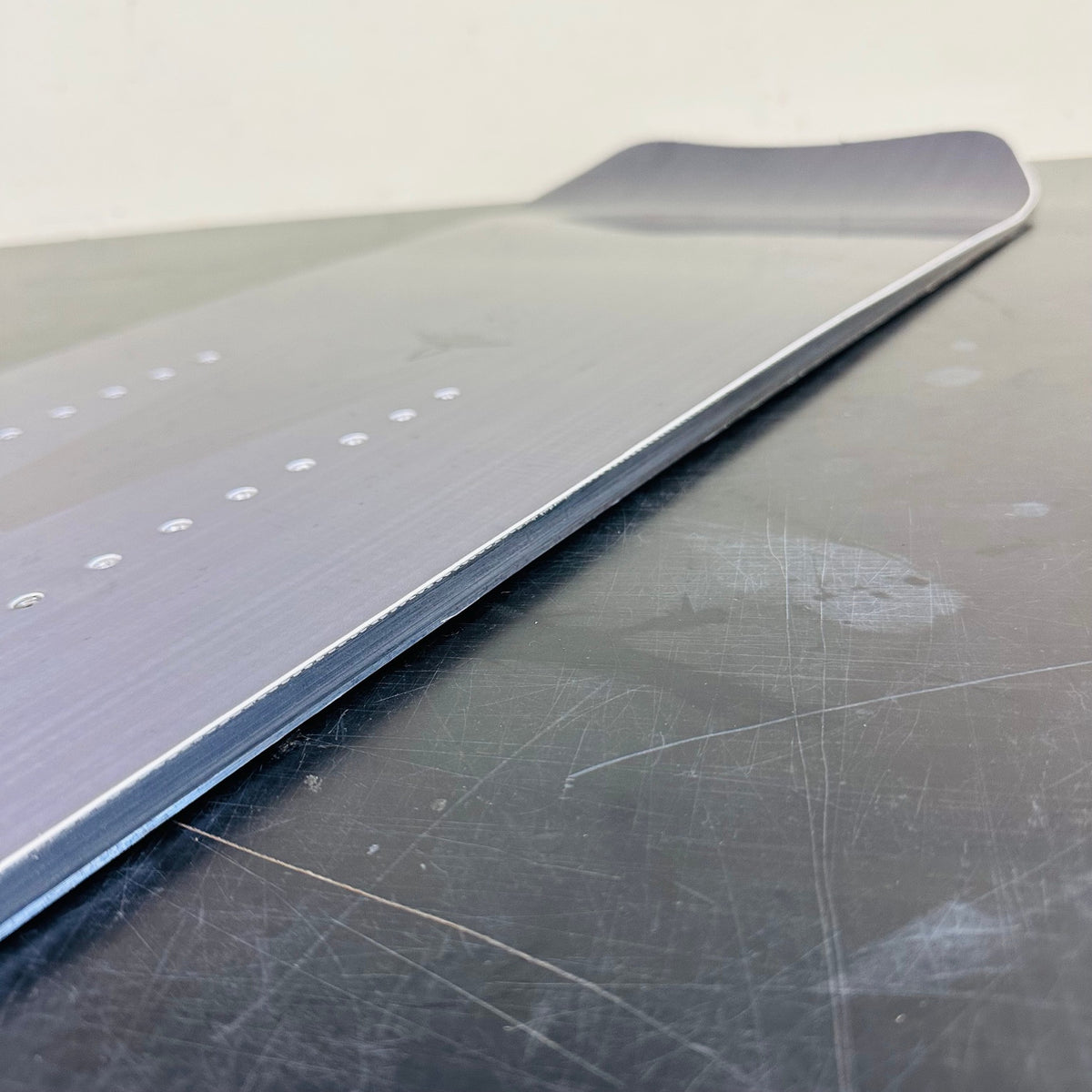 Top sheet, mounting inserts, and side profile