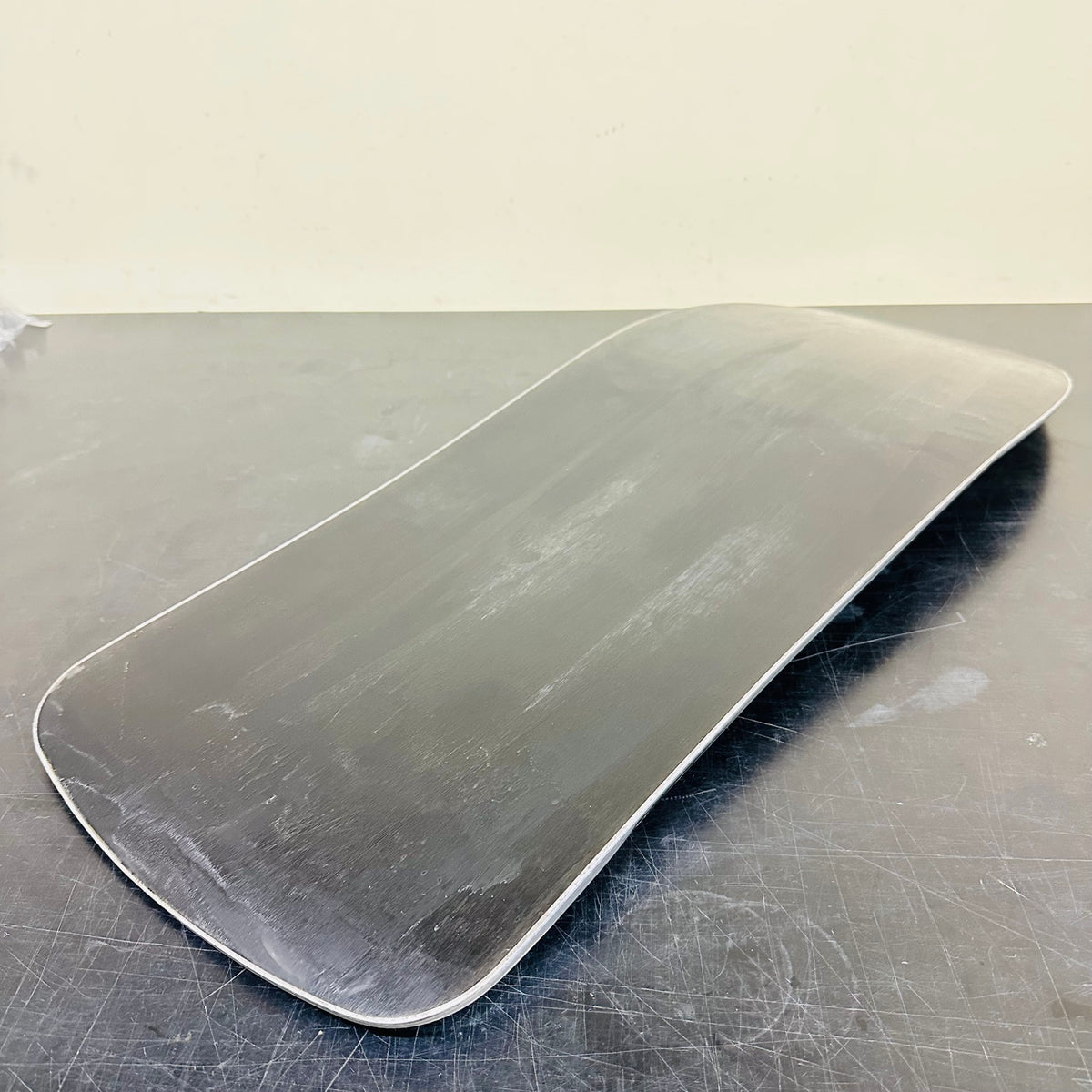 Used TORINITY SSST hard-flex black prototype front board: Angled base view showing surface wear